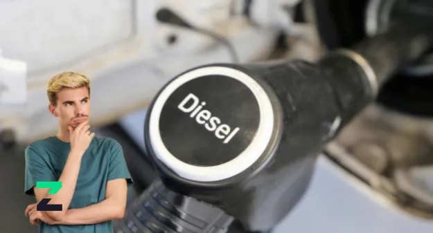 homme qui se questionne avec pistolet carburat Diesel